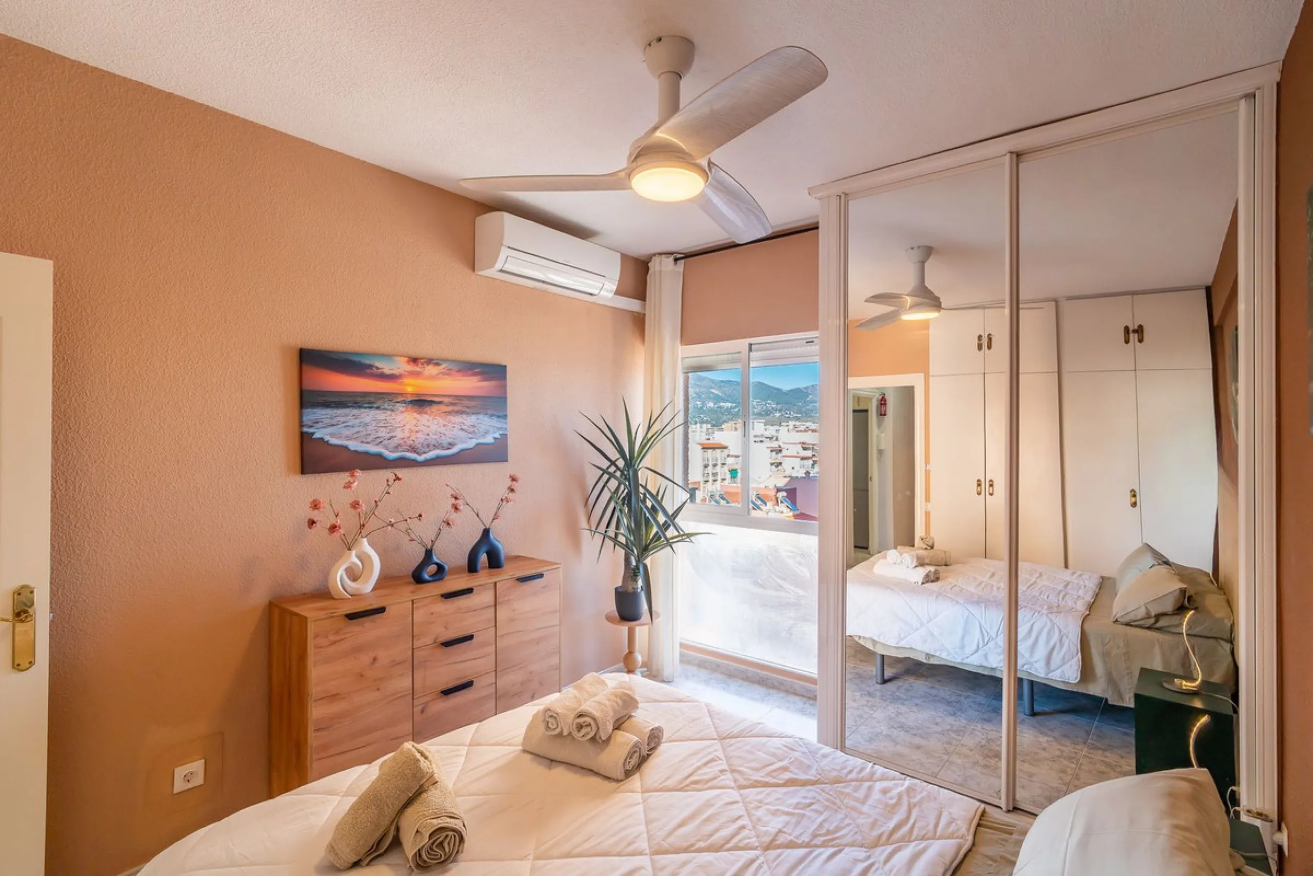 Discover this pristine, fully furnished 1-bedroom apartment in the iconic Edificio Perla 5, ideally positioned frontline beach in the very heart of Fuengirola, Málaga. Priced at €322,500, this residence offers spectacular beach and city views, combining M