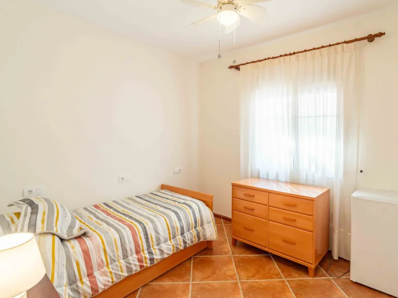 Built in 2007 and kept in excellent condition, this beautiful countryside villa offers a peaceful lifestyle with modern comforts, just minutes from La Trocha Shopping Centre and only a short drive to Málaga, the airport, and the Costa del Sol's beaches.