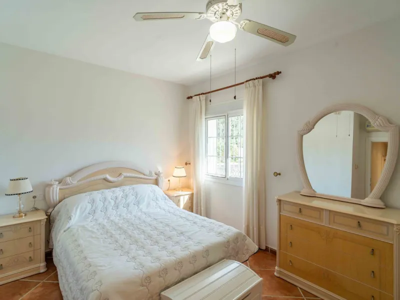 Built in 2007 and kept in excellent condition, this beautiful countryside villa offers a peaceful lifestyle with modern comforts, just minutes from La Trocha Shopping Centre and only a short drive to Málaga, the airport, and the Costa del Sol's beaches.