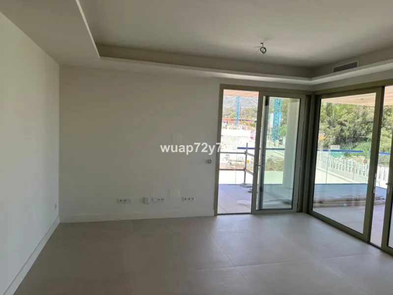 Set within Benalus, one of the most exclusive gated communities on Marbella's prestigious Golden Mile, this exceptional brand-new two-bedroom residence represents the essence of contemporary Mediterranean luxury. Located just moments from the beach and di