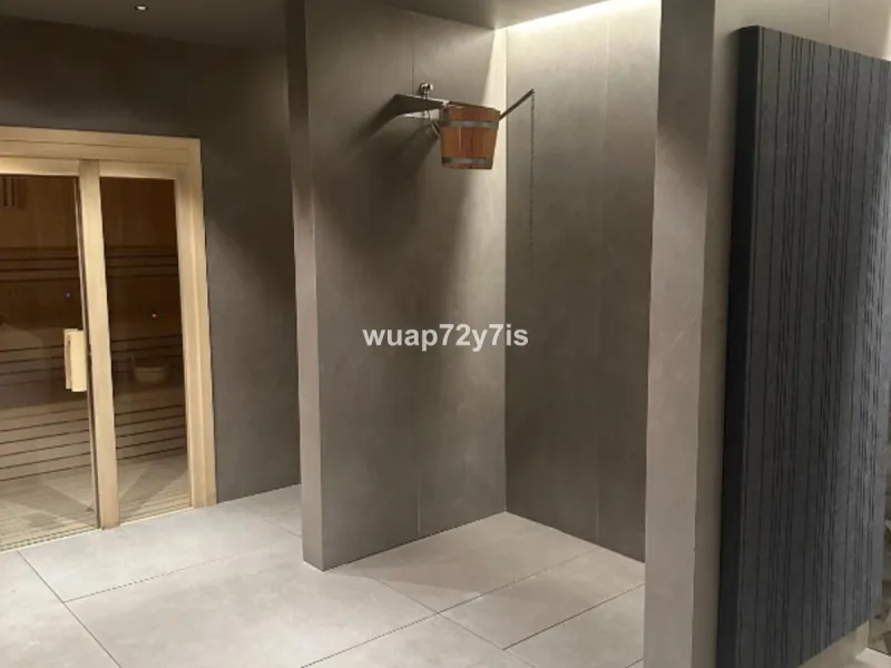 Set within Benalus, one of the most exclusive gated communities on Marbella's prestigious Golden Mile, this exceptional brand-new two-bedroom residence represents the essence of contemporary Mediterranean luxury. Located just moments from the beach and di