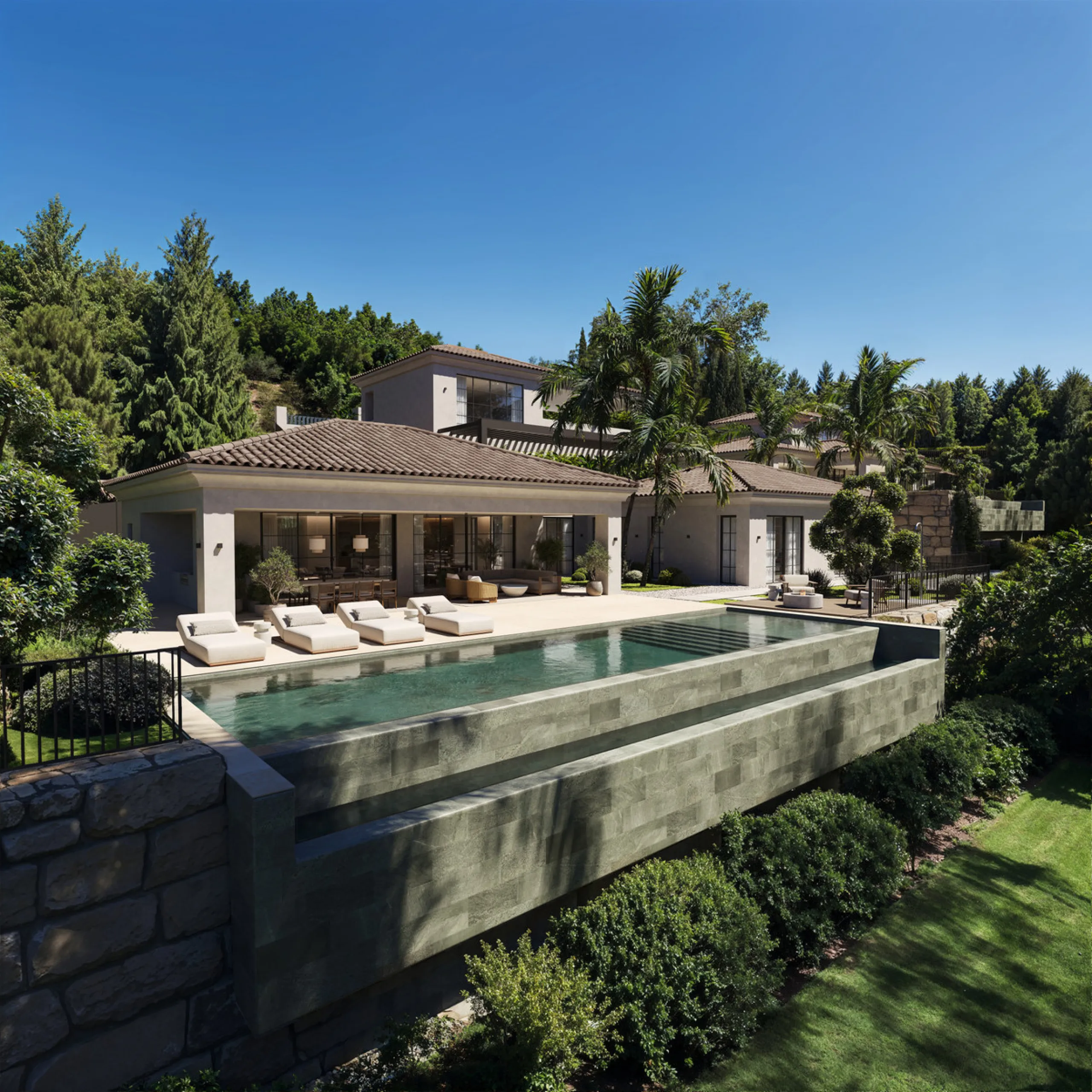 An outstanding opportunity to acquire a premium plot with an approved project and building license for the construction of an elegant contemporary villa with a total built area of 671 m², distributed across three levels: two above-ground floors plus a roo