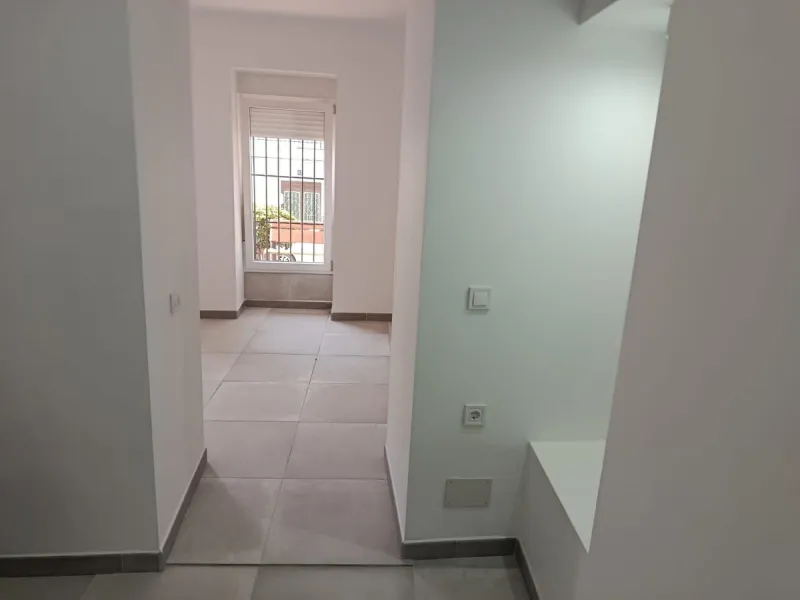 One-storey townhouse in the centre of the village of Alhaurín el Grande, located in the protected area of the historic centre on the "Calle Nueva" street, one of the main and most exclusive streets in the town, where the Holy Week processions parade passe