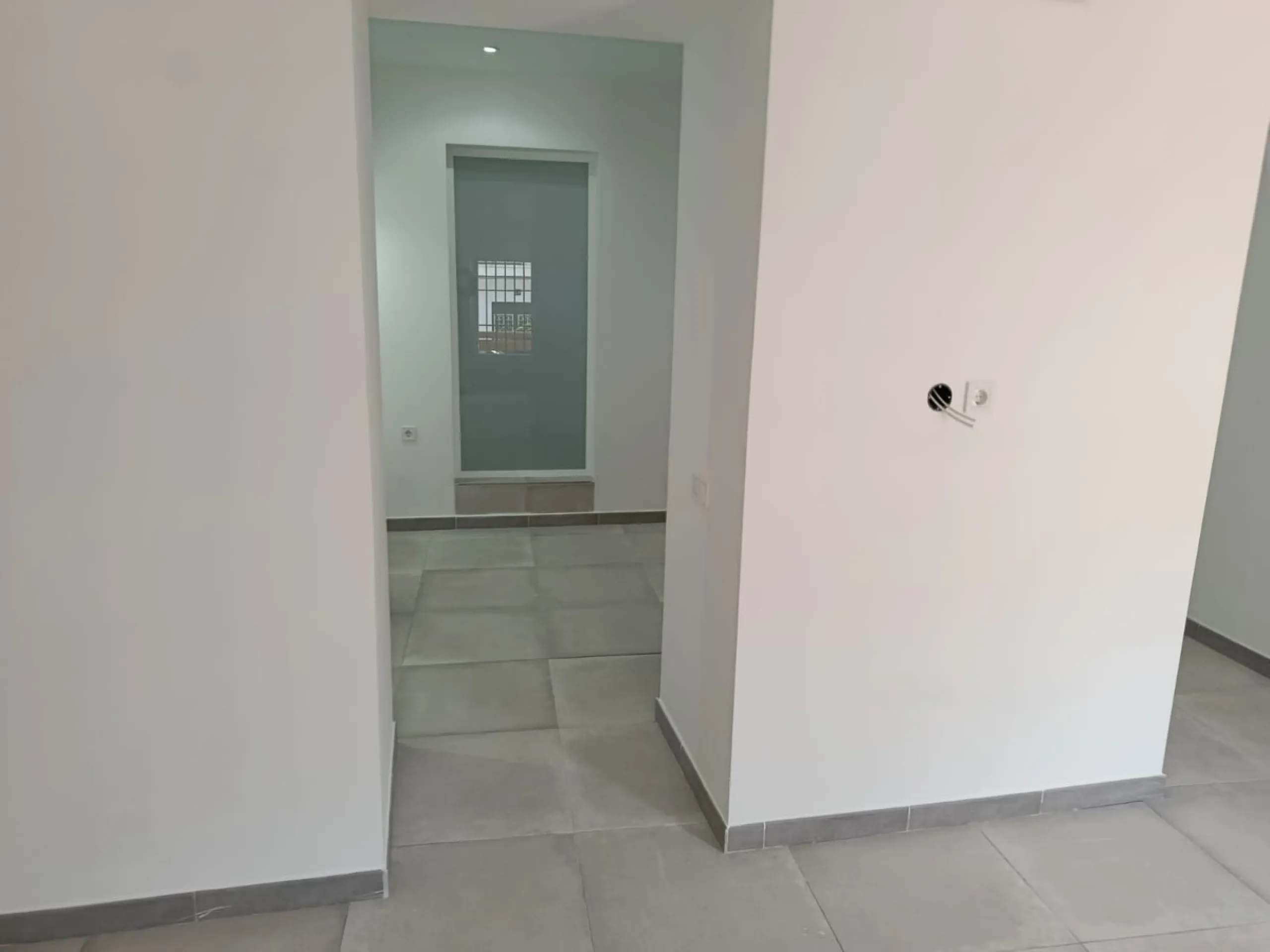 One-storey townhouse in the centre of the village of Alhaurín el Grande, located in the protected area of the historic centre on the "Calle Nueva" street, one of the main and most exclusive streets in the town, where the Holy Week processions parade passe