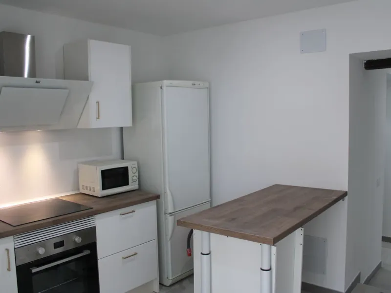 One-storey townhouse in the centre of the village of Alhaurín el Grande, located in the protected area of the historic centre on the "Calle Nueva" street, one of the main and most exclusive streets in the town, where the Holy Week processions parade passe