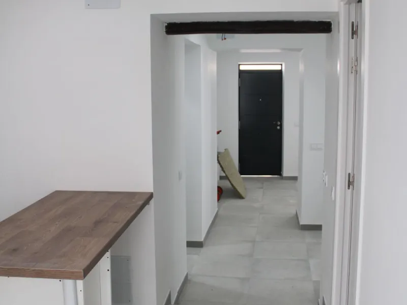 One-storey townhouse in the centre of the village of Alhaurín el Grande, located in the protected area of the historic centre on the "Calle Nueva" street, one of the main and most exclusive streets in the town, where the Holy Week processions parade passe