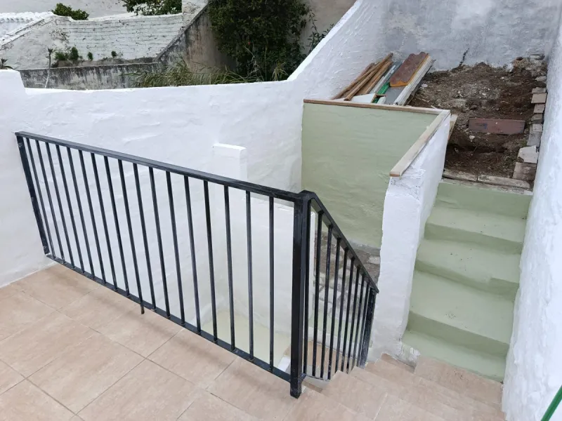 One-storey townhouse in the centre of the village of Alhaurín el Grande, located in the protected area of the historic centre on the "Calle Nueva" street, one of the main and most exclusive streets in the town, where the Holy Week processions parade passe