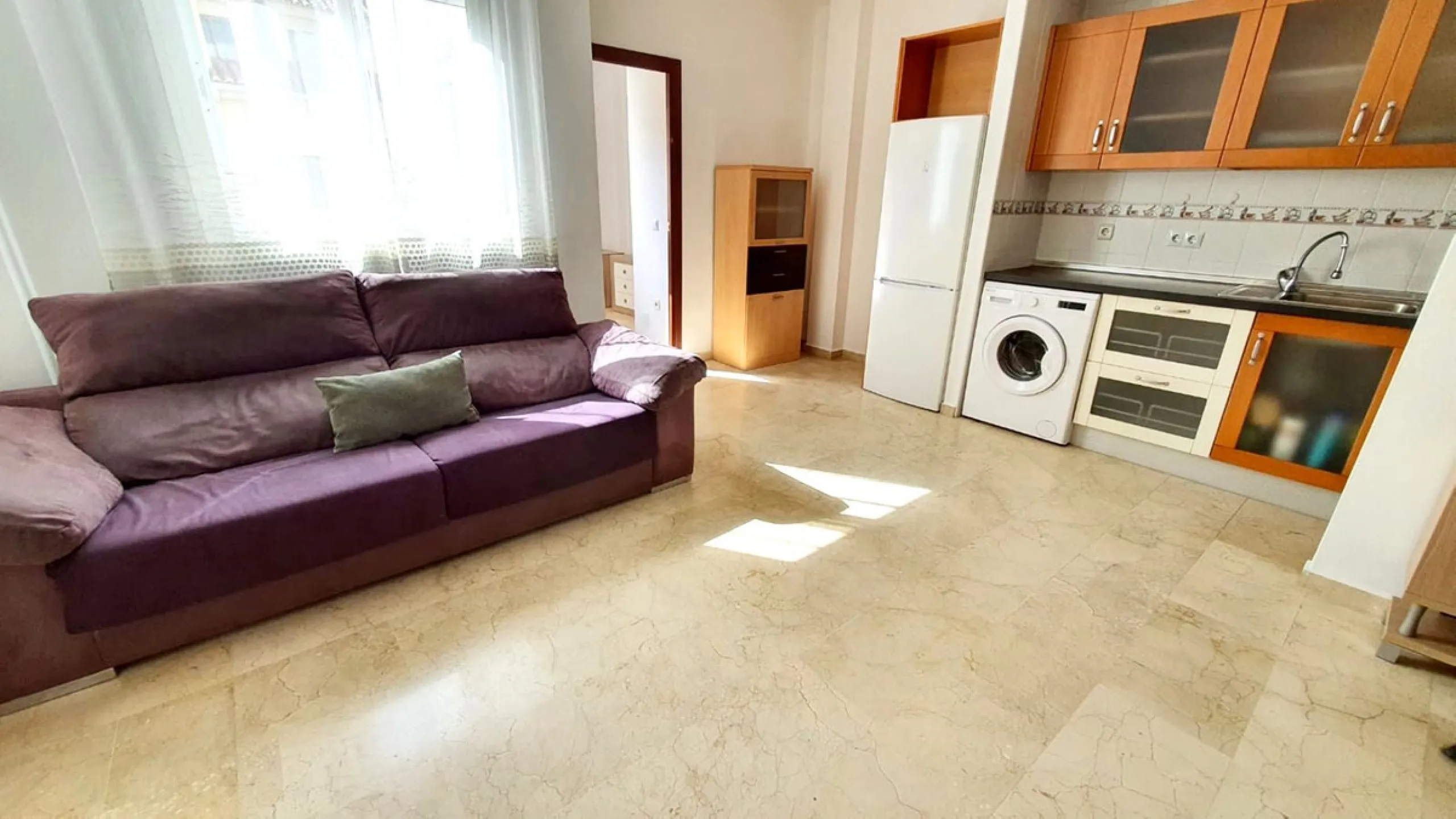 Third line beach cozy apartment in a quite and private street in the centre of Fuengirola. It is a very tranquil street as only residents can go in as you have to register your plate number in the townhall. The property has a modern open plan layout and o