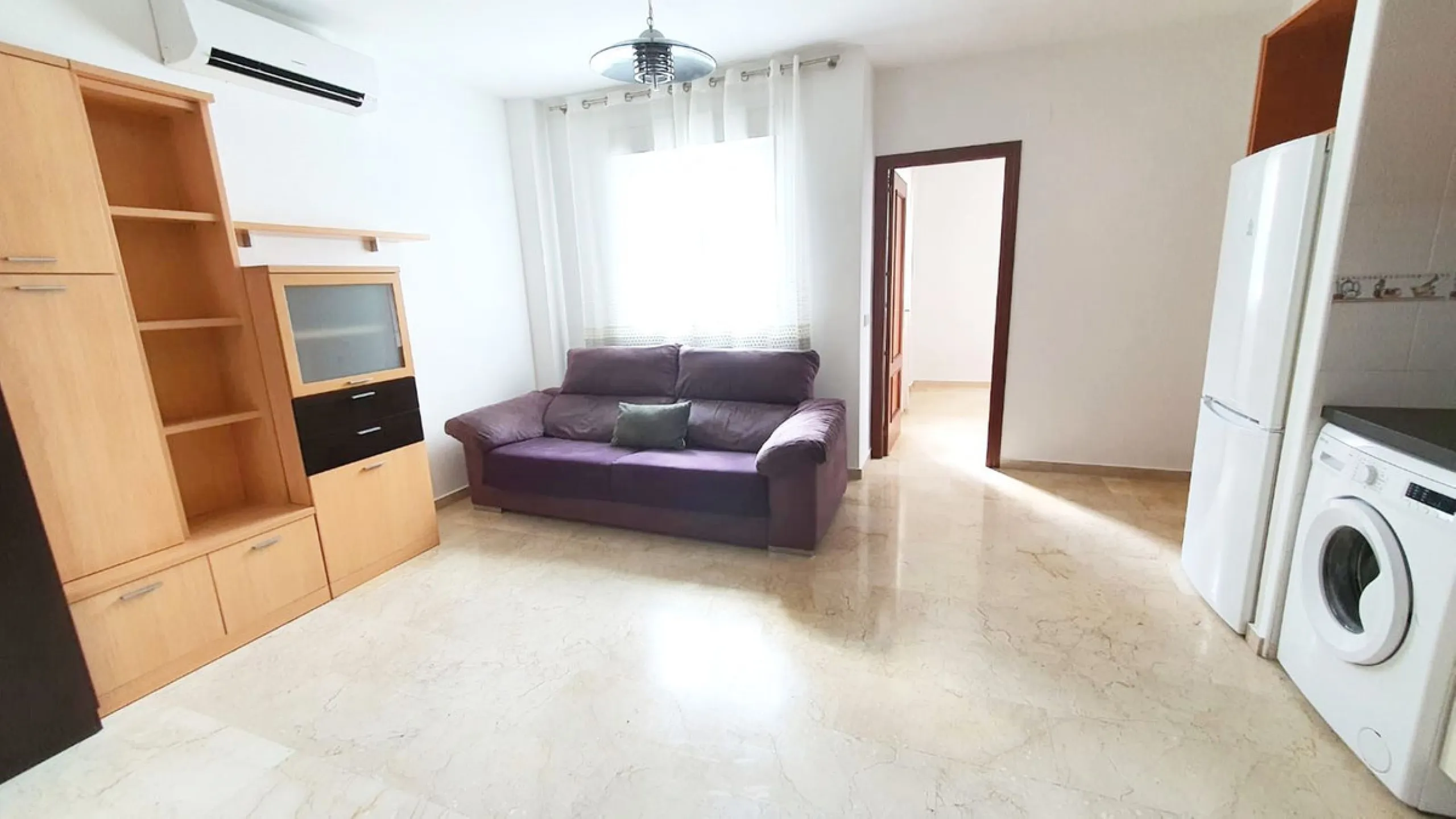 Third line beach cozy apartment in a quite and private street in the centre of Fuengirola. It is a very tranquil street as only residents can go in as you have to register your plate number in the townhall. The property has a modern open plan layout and o