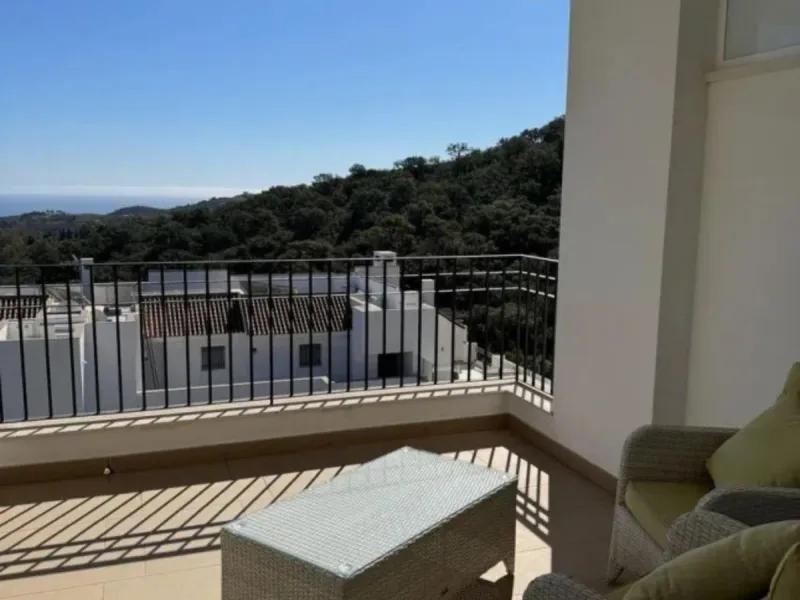 Stunning corner first-floor apartment with superb sea and mountain views, located in the protected area of La Mairena (UNESCO Biosphere Reserve) on the hills above Elviria.
