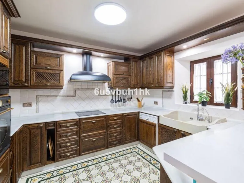 We present this beautiful home, located in the heart of Fuengirola, a gem lovingly restored with respect for its historic origins. The property retains original features that add character and exclusivity, such as its charming Sevillian patio and carefull