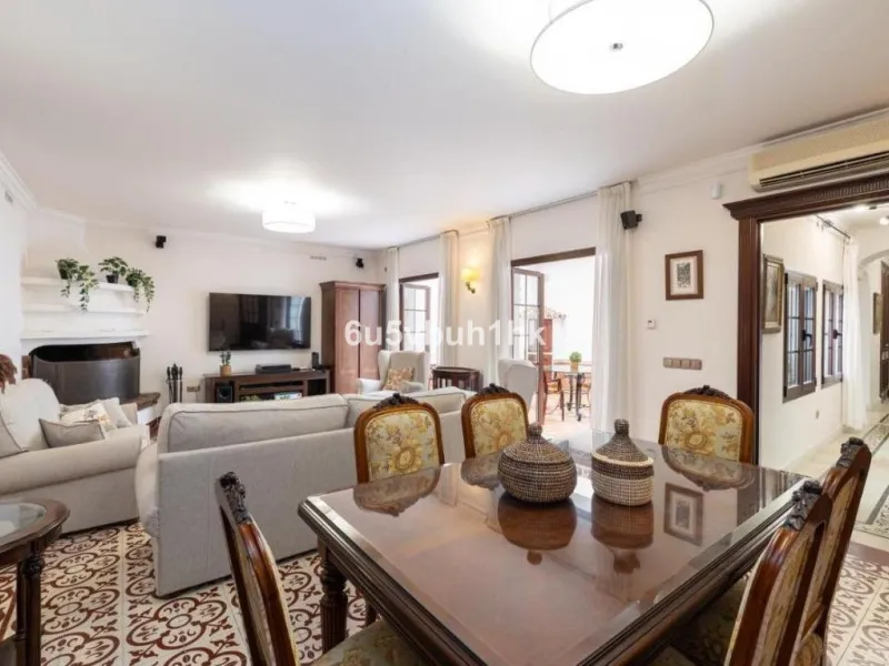 We present this beautiful home, located in the heart of Fuengirola, a gem lovingly restored with respect for its historic origins. The property retains original features that add character and exclusivity, such as its charming Sevillian patio and carefull