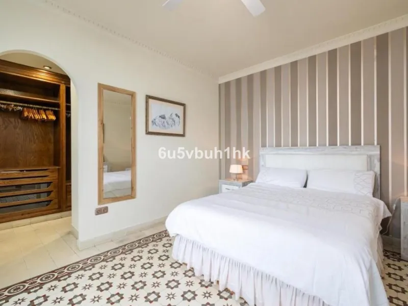 We present this beautiful home, located in the heart of Fuengirola, a gem lovingly restored with respect for its historic origins. The property retains original features that add character and exclusivity, such as its charming Sevillian patio and carefull