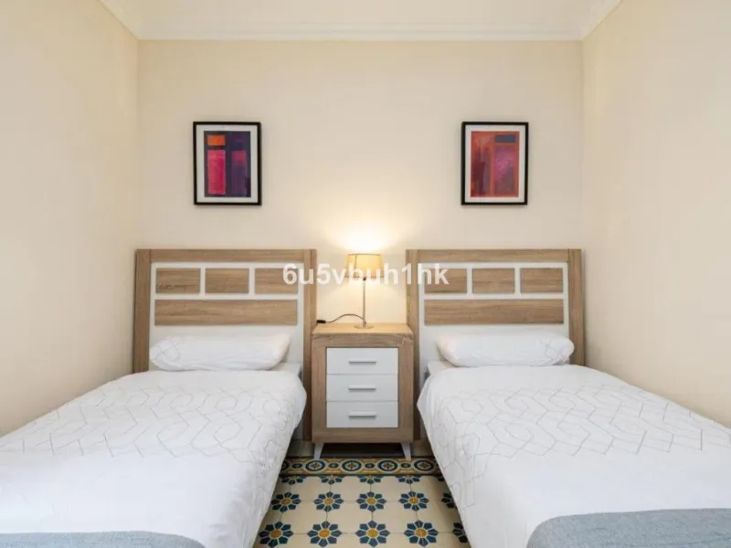 We present this beautiful home, located in the heart of Fuengirola, a gem lovingly restored with respect for its historic origins. The property retains original features that add character and exclusivity, such as its charming Sevillian patio and carefull