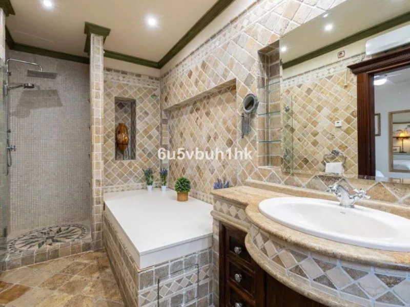 We present this beautiful home, located in the heart of Fuengirola, a gem lovingly restored with respect for its historic origins. The property retains original features that add character and exclusivity, such as its charming Sevillian patio and carefull