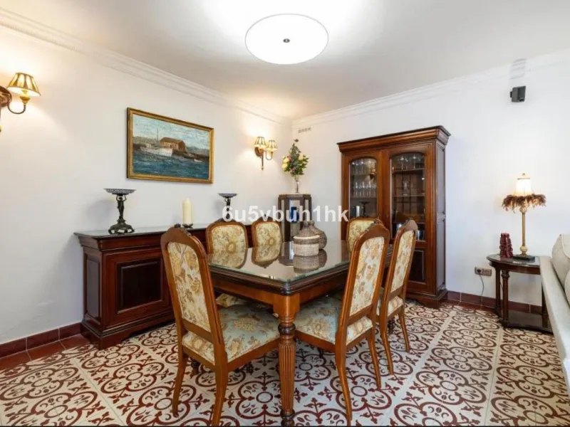 We present this beautiful home, located in the heart of Fuengirola, a gem lovingly restored with respect for its historic origins. The property retains original features that add character and exclusivity, such as its charming Sevillian patio and carefull