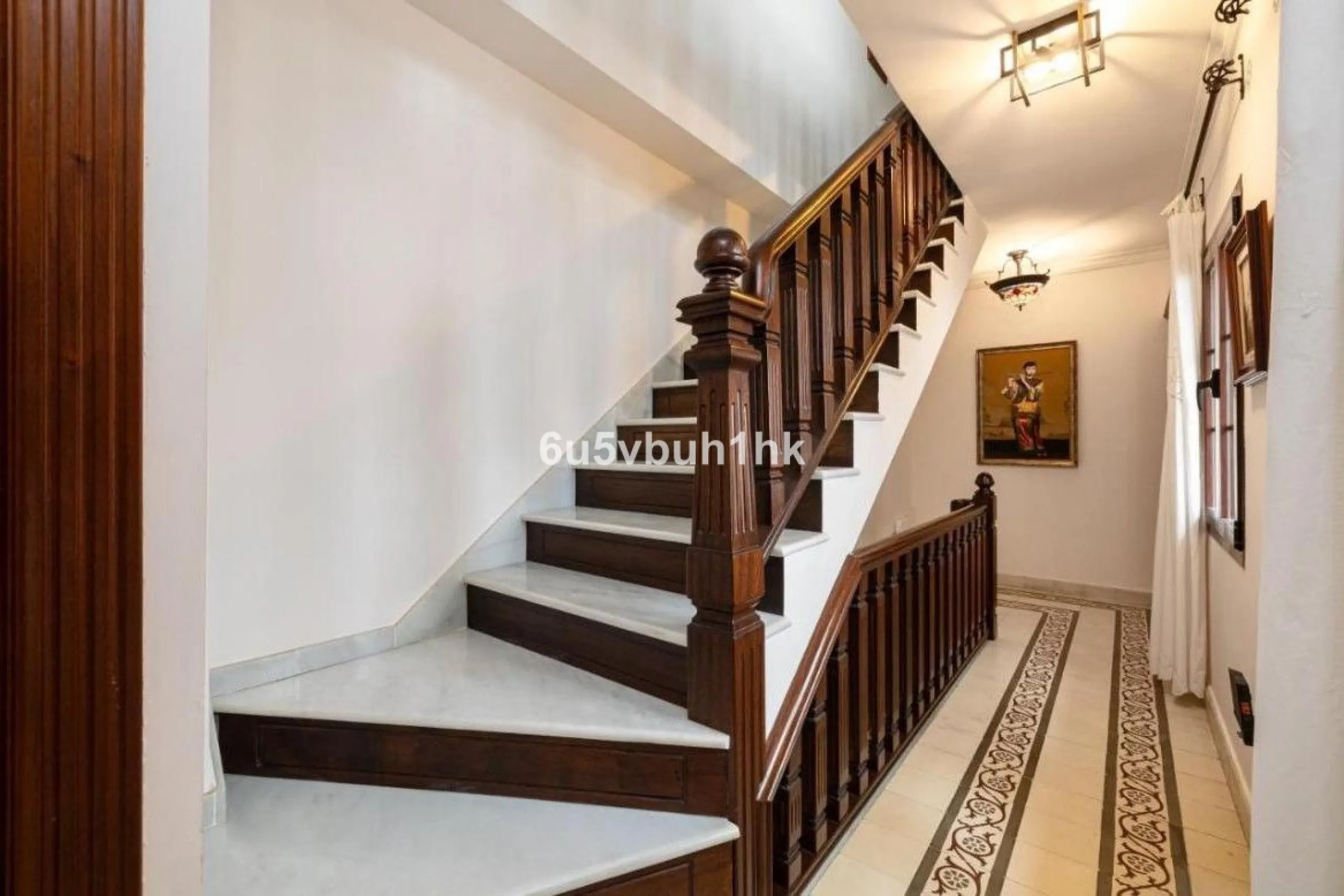 We present this beautiful home, located in the heart of Fuengirola, a gem lovingly restored with respect for its historic origins. The property retains original features that add character and exclusivity, such as its charming Sevillian patio and carefull