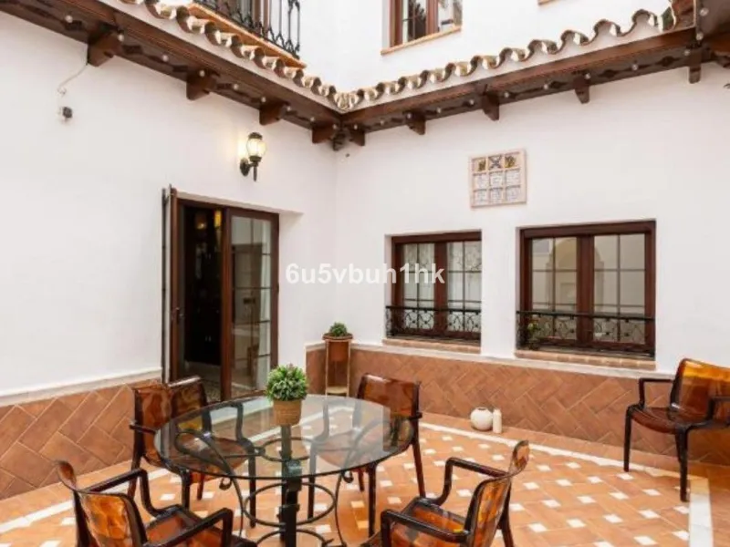 We present this beautiful home, located in the heart of Fuengirola, a gem lovingly restored with respect for its historic origins. The property retains original features that add character and exclusivity, such as its charming Sevillian patio and carefull