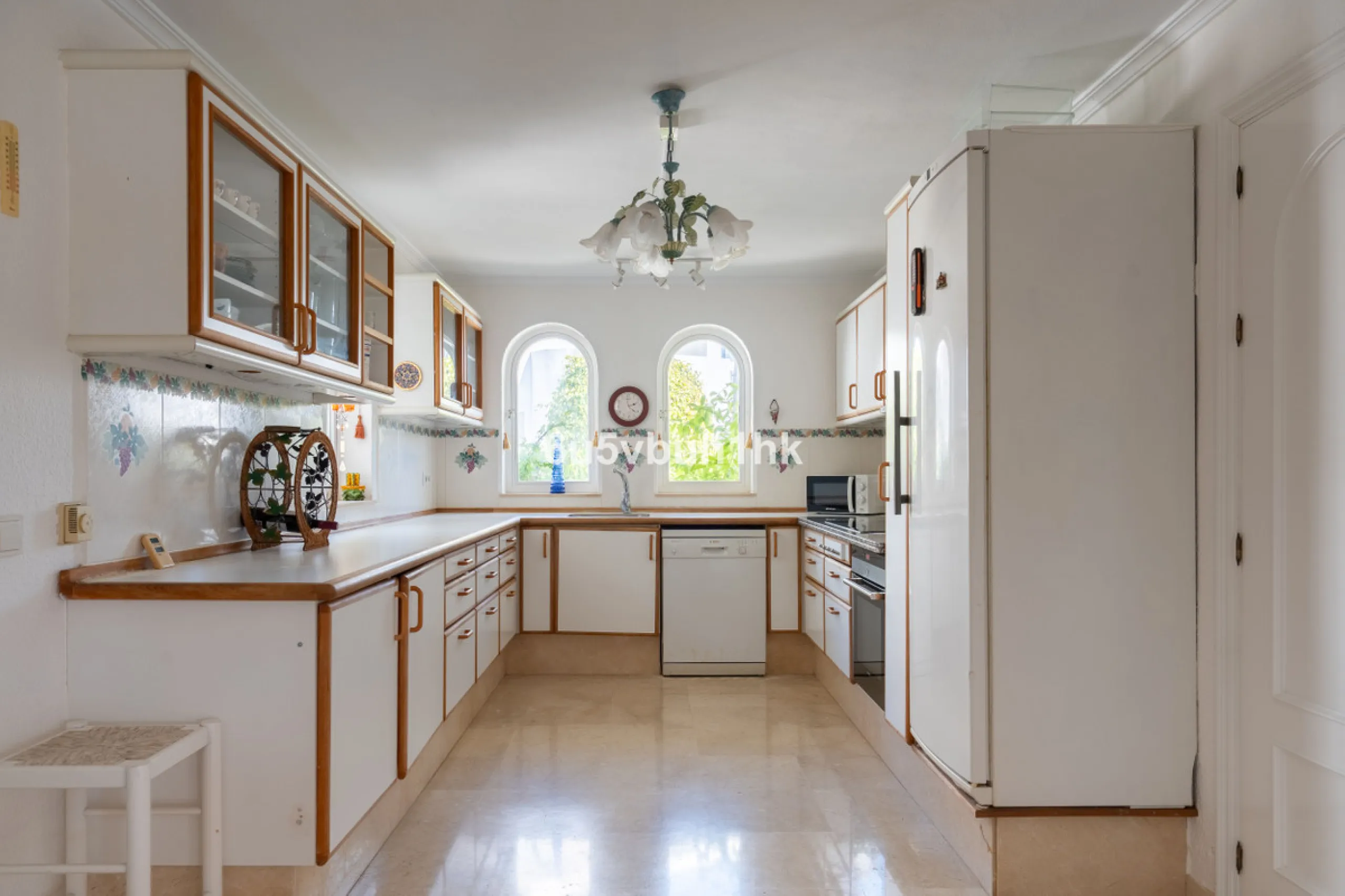 Hidden among palm trees and mature gardens in the established residential area of Sitio de Calahonda, this beautiful Andalusian villa captures the essence of traditional Mediterranean living. From the moment you arrive through the private gated entrance a