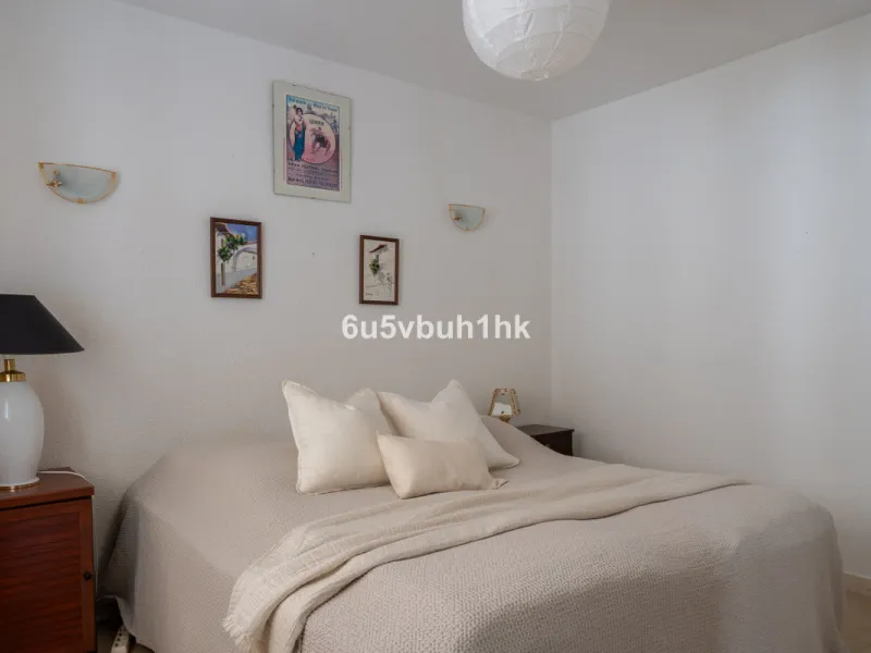 Hidden among palm trees and mature gardens in the established residential area of Sitio de Calahonda, this beautiful Andalusian villa captures the essence of traditional Mediterranean living. From the moment you arrive through the private gated entrance a