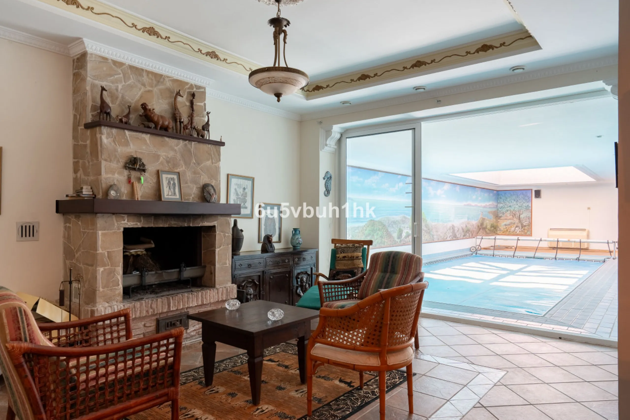 Hidden among palm trees and mature gardens in the established residential area of Sitio de Calahonda, this beautiful Andalusian villa captures the essence of traditional Mediterranean living. From the moment you arrive through the private gated entrance a