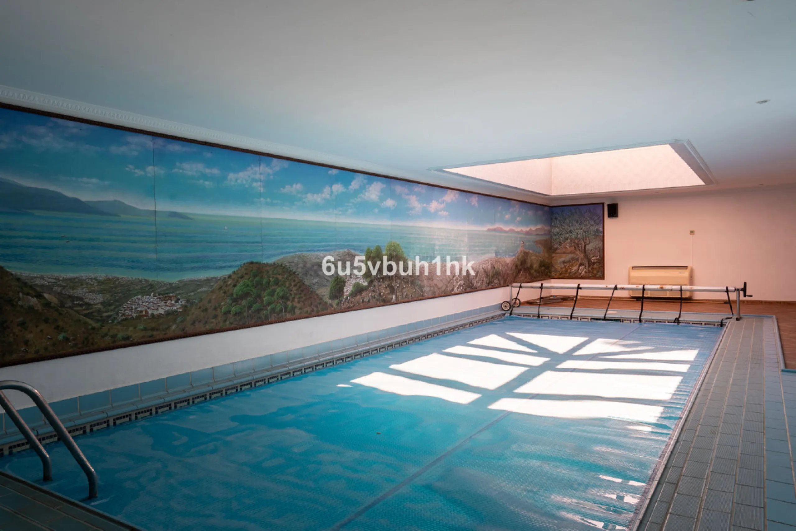 Hidden among palm trees and mature gardens in the established residential area of Sitio de Calahonda, this beautiful Andalusian villa captures the essence of traditional Mediterranean living. From the moment you arrive through the private gated entrance a