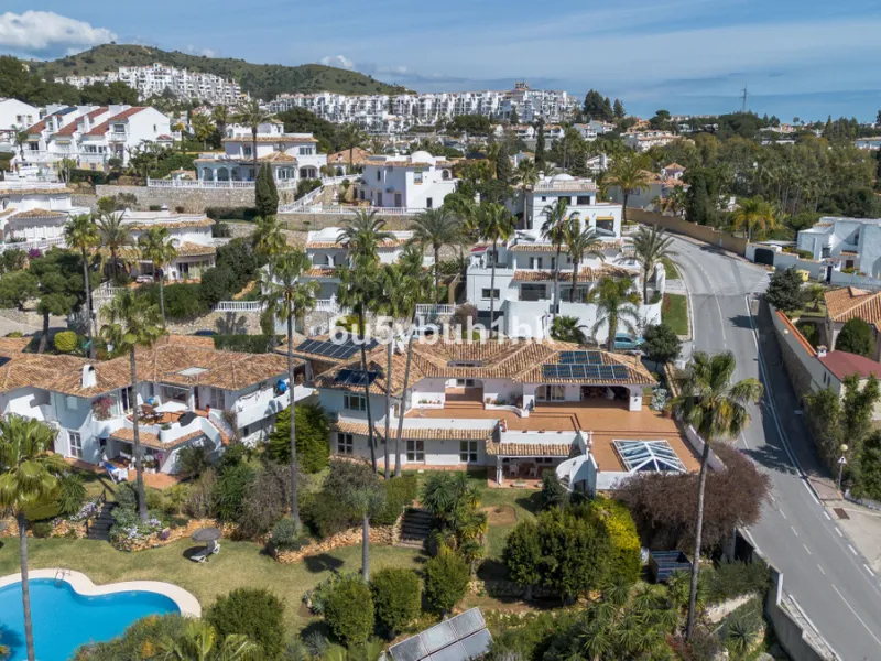Hidden among palm trees and mature gardens in the established residential area of Sitio de Calahonda, this beautiful Andalusian villa captures the essence of traditional Mediterranean living. From the moment you arrive through the private gated entrance a