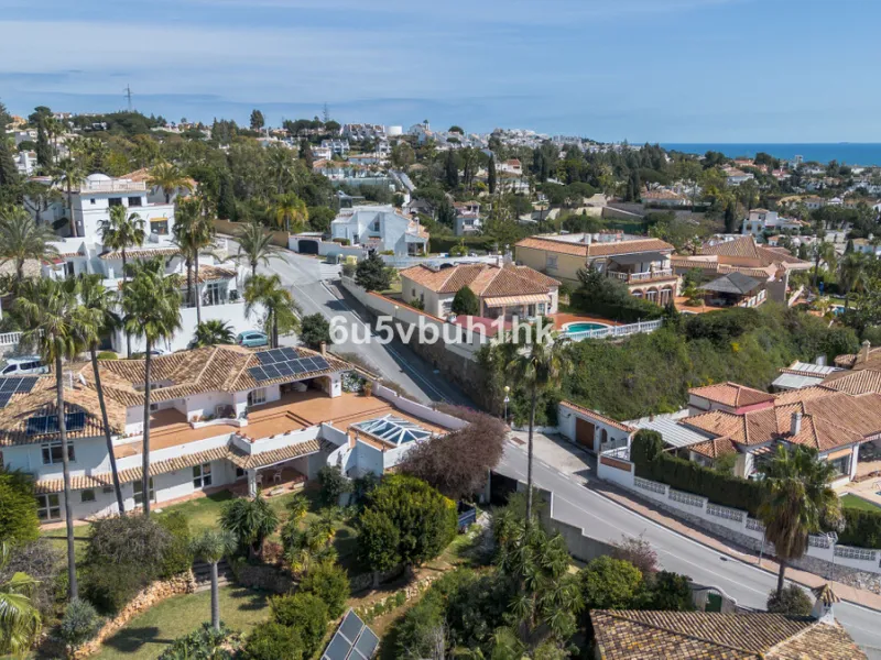 Hidden among palm trees and mature gardens in the established residential area of Sitio de Calahonda, this beautiful Andalusian villa captures the essence of traditional Mediterranean living. From the moment you arrive through the private gated entrance a