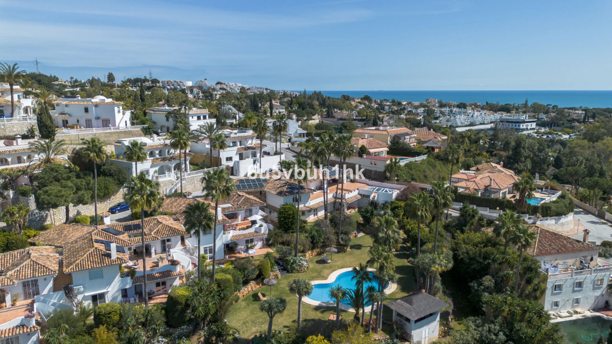 Hidden among palm trees and mature gardens in the established residential area of Sitio de Calahonda, this beautiful Andalusian villa captures the essence of traditional Mediterranean living. From the moment you arrive through the private gated entrance a