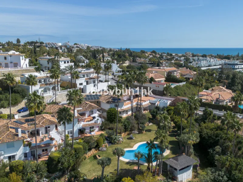Hidden among palm trees and mature gardens in the established residential area of Sitio de Calahonda, this beautiful Andalusian villa captures the essence of traditional Mediterranean living. From the moment you arrive through the private gated entrance a