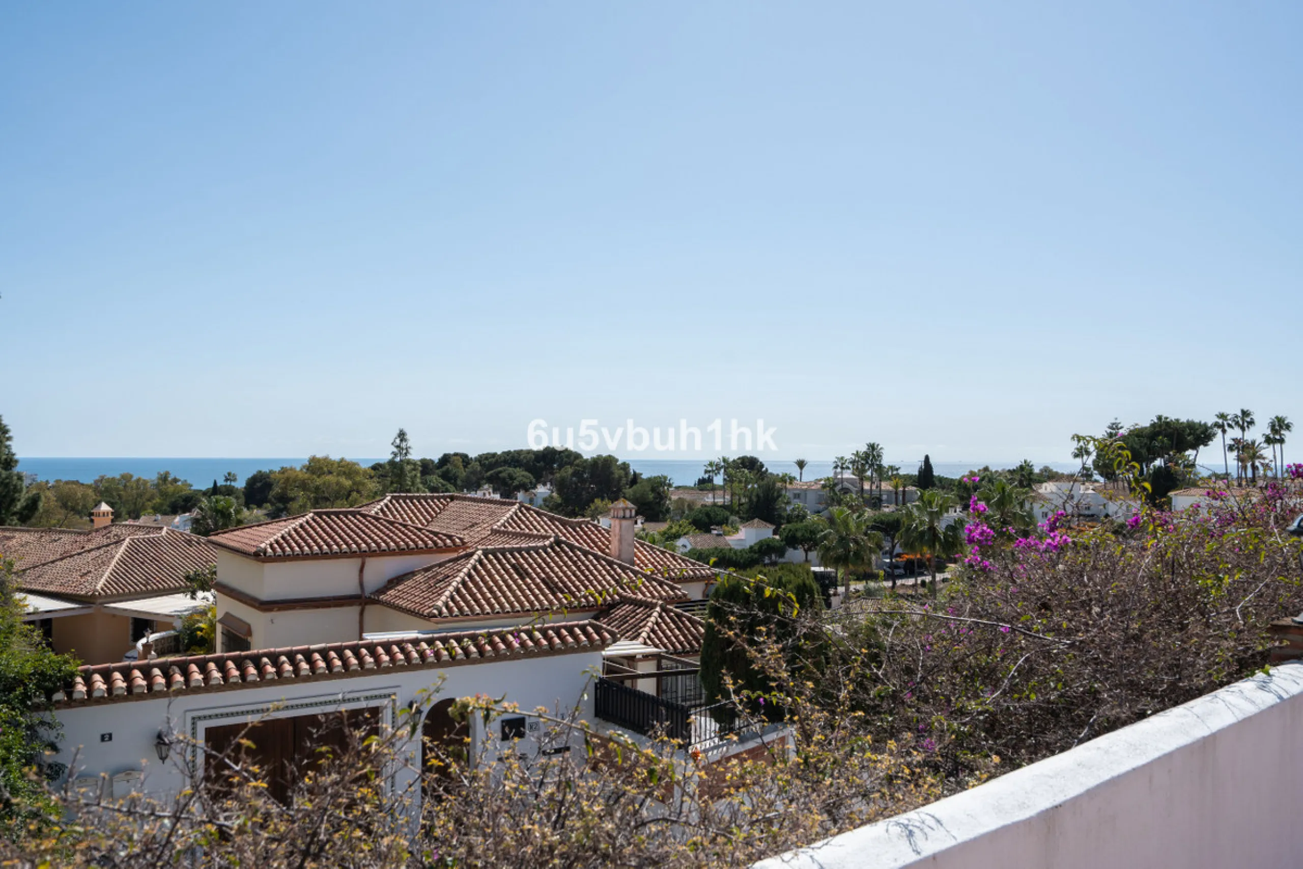 Hidden among palm trees and mature gardens in the established residential area of Sitio de Calahonda, this beautiful Andalusian villa captures the essence of traditional Mediterranean living. From the moment you arrive through the private gated entrance a