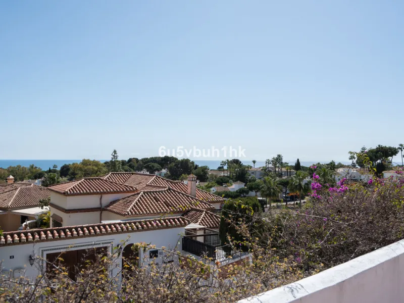 Hidden among palm trees and mature gardens in the established residential area of Sitio de Calahonda, this beautiful Andalusian villa captures the essence of traditional Mediterranean living. From the moment you arrive through the private gated entrance a