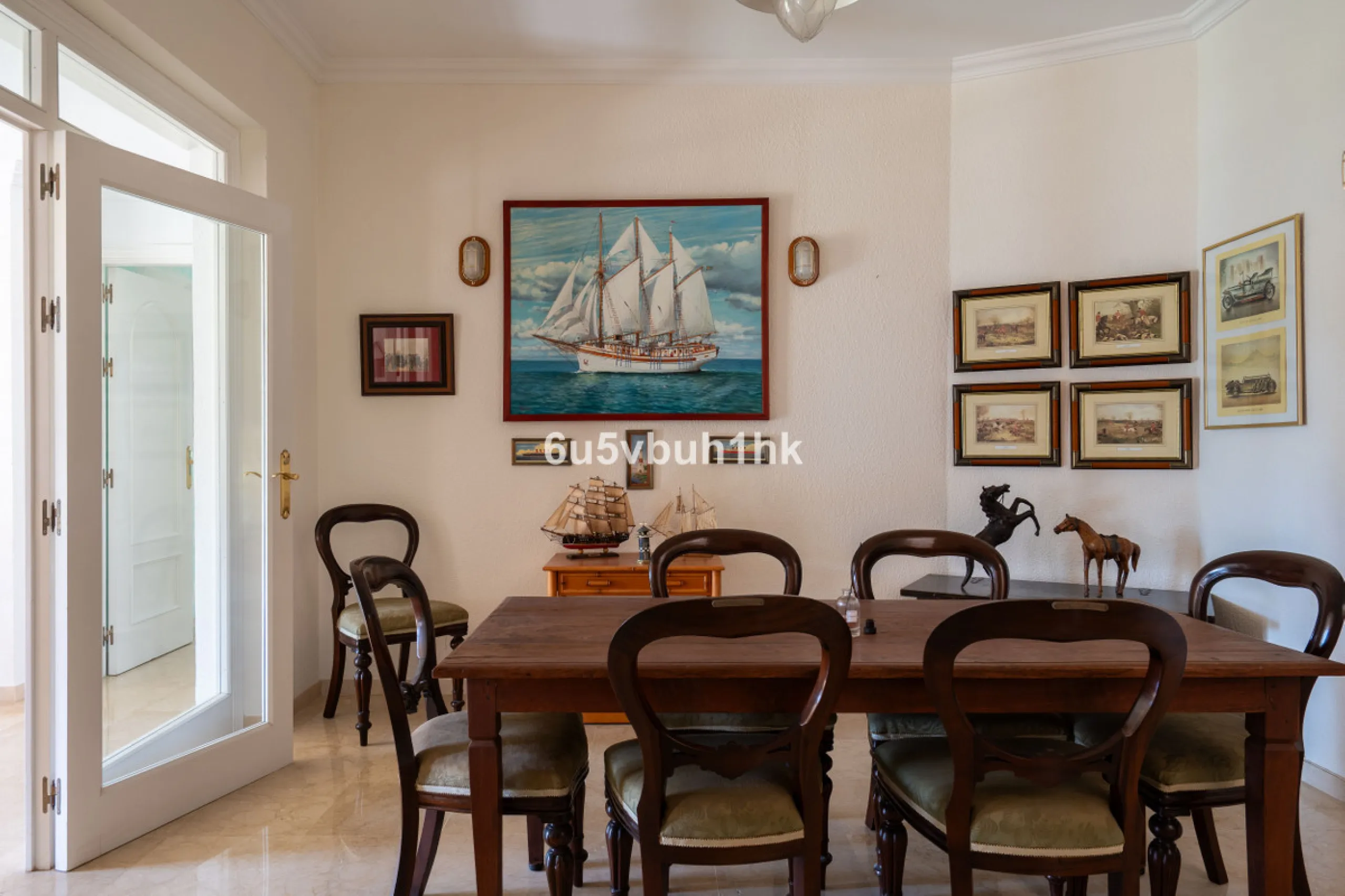 Hidden among palm trees and mature gardens in the established residential area of Sitio de Calahonda, this beautiful Andalusian villa captures the essence of traditional Mediterranean living. From the moment you arrive through the private gated entrance a