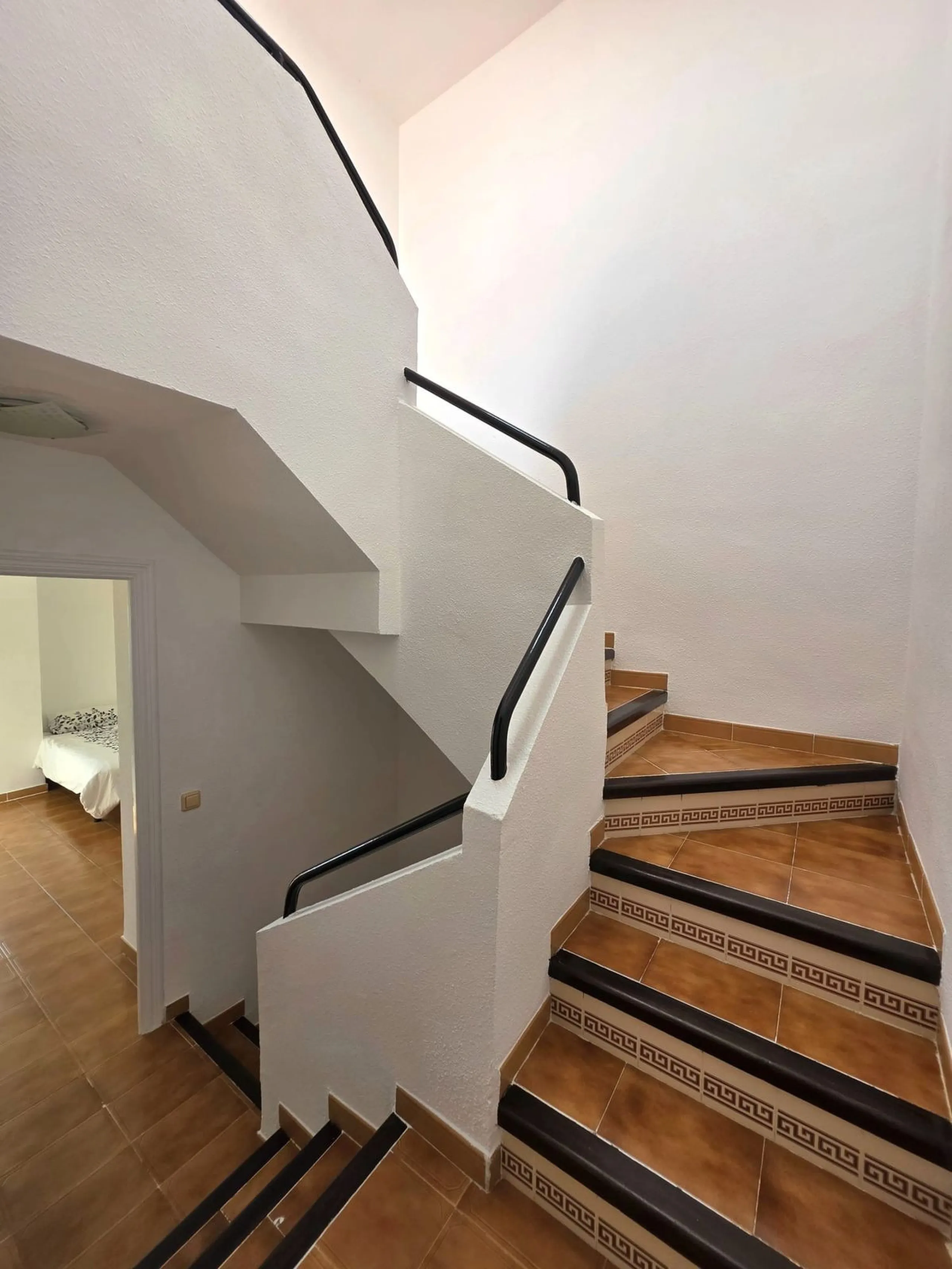 This beautiful 3 bed townhouse is located in a fantastic area, walking distance to all amenities and the beach. The house is Andalucian in style, built over 3 levels and sold fully furnished. On the ground level you are greeted by an entrance hall and lar