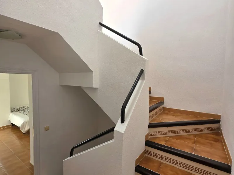 This beautiful 3 bed townhouse is located in a fantastic area, walking distance to all amenities and the beach. The house is Andalucian in style, built over 3 levels and sold fully furnished. On the ground level you are greeted by an entrance hall and lar
