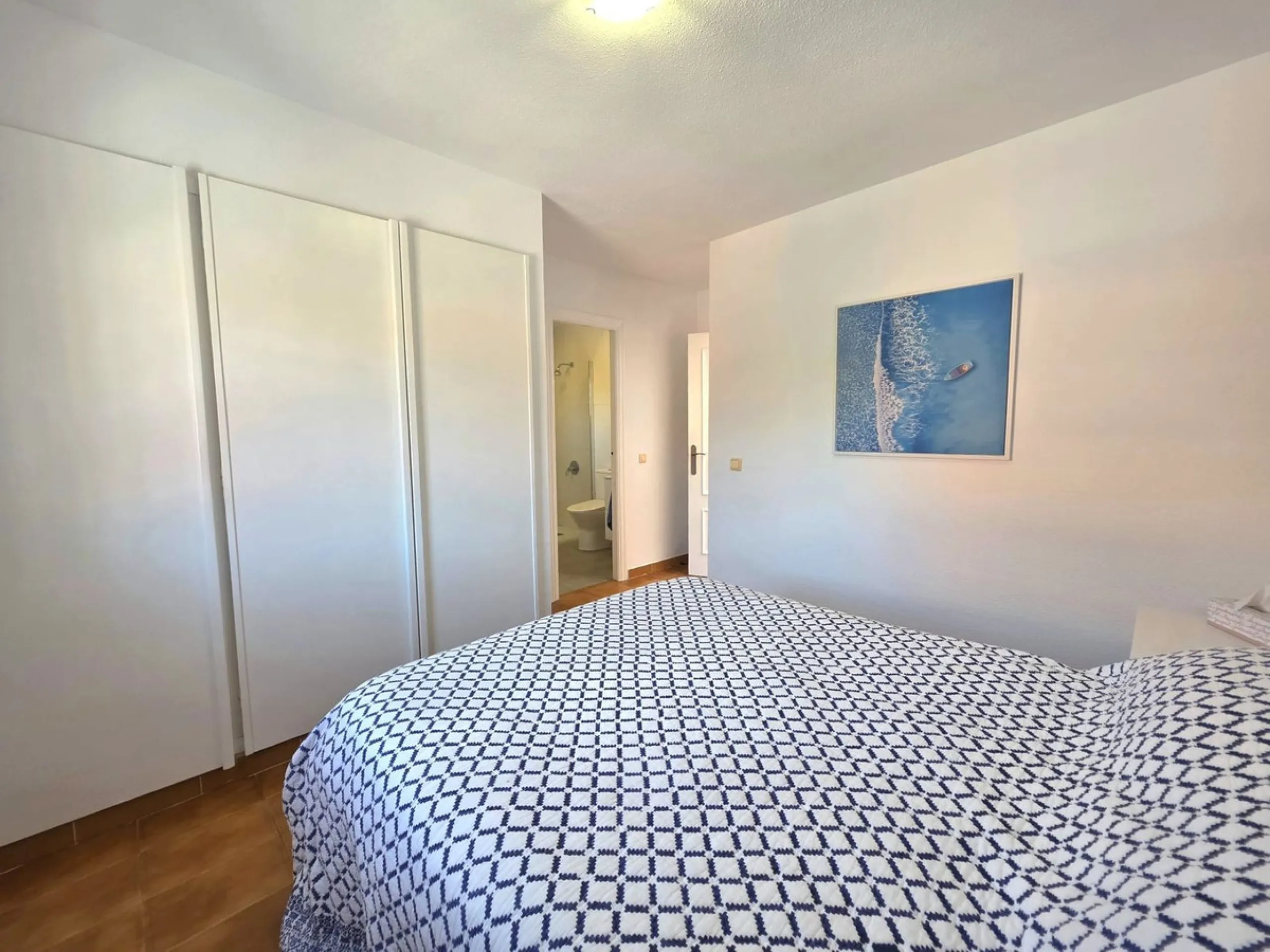 This beautiful 3 bed townhouse is located in a fantastic area, walking distance to all amenities and the beach. The house is Andalucian in style, built over 3 levels and sold fully furnished. On the ground level you are greeted by an entrance hall and lar