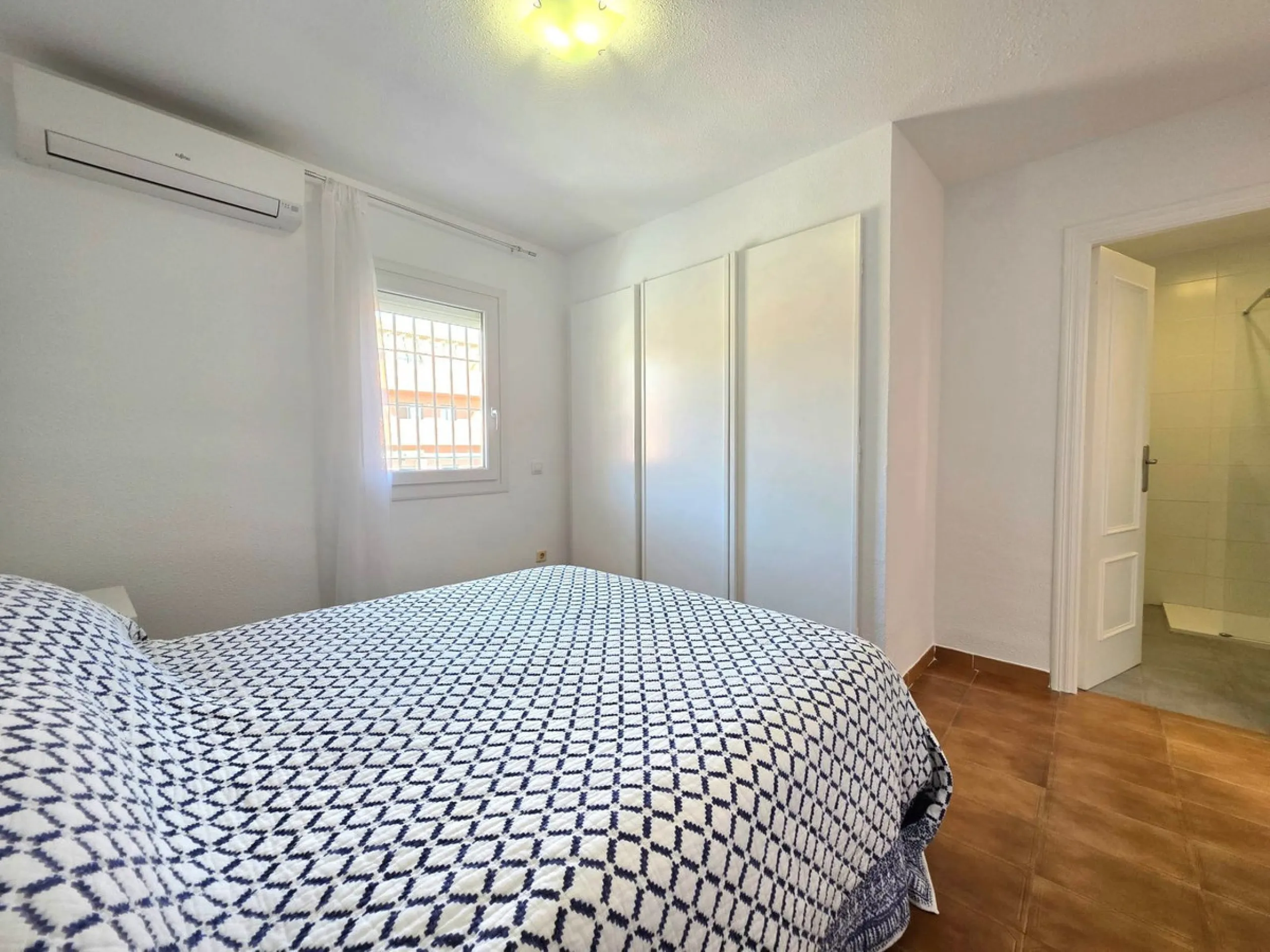 This beautiful 3 bed townhouse is located in a fantastic area, walking distance to all amenities and the beach. The house is Andalucian in style, built over 3 levels and sold fully furnished. On the ground level you are greeted by an entrance hall and lar