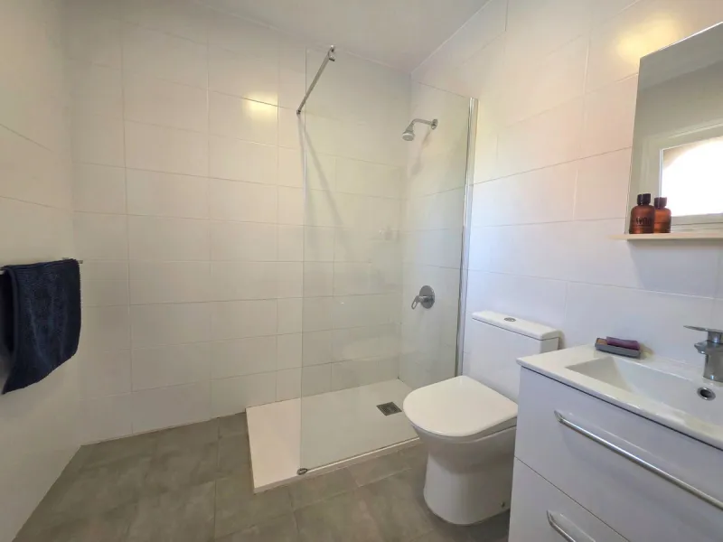 This beautiful 3 bed townhouse is located in a fantastic area, walking distance to all amenities and the beach. The house is Andalucian in style, built over 3 levels and sold fully furnished. On the ground level you are greeted by an entrance hall and lar
