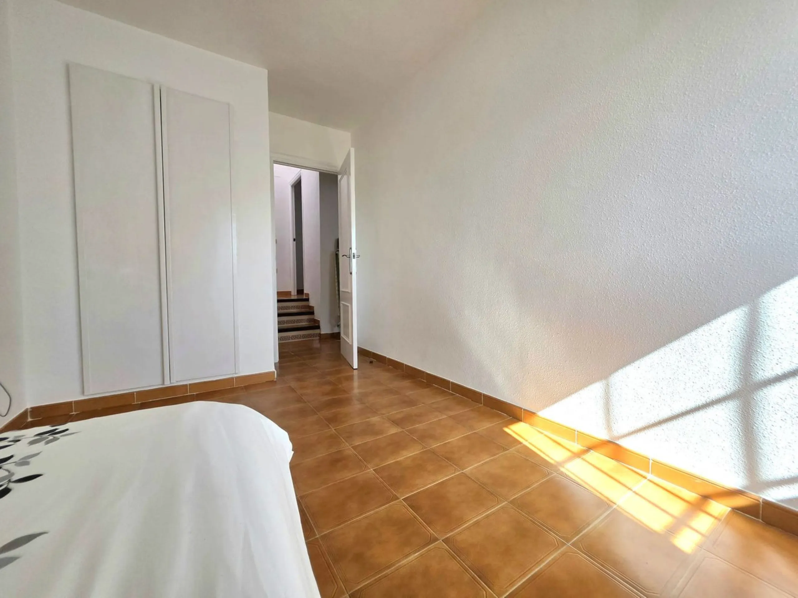 This beautiful 3 bed townhouse is located in a fantastic area, walking distance to all amenities and the beach. The house is Andalucian in style, built over 3 levels and sold fully furnished. On the ground level you are greeted by an entrance hall and lar