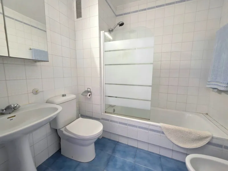 This beautiful 3 bed townhouse is located in a fantastic area, walking distance to all amenities and the beach. The house is Andalucian in style, built over 3 levels and sold fully furnished. On the ground level you are greeted by an entrance hall and lar