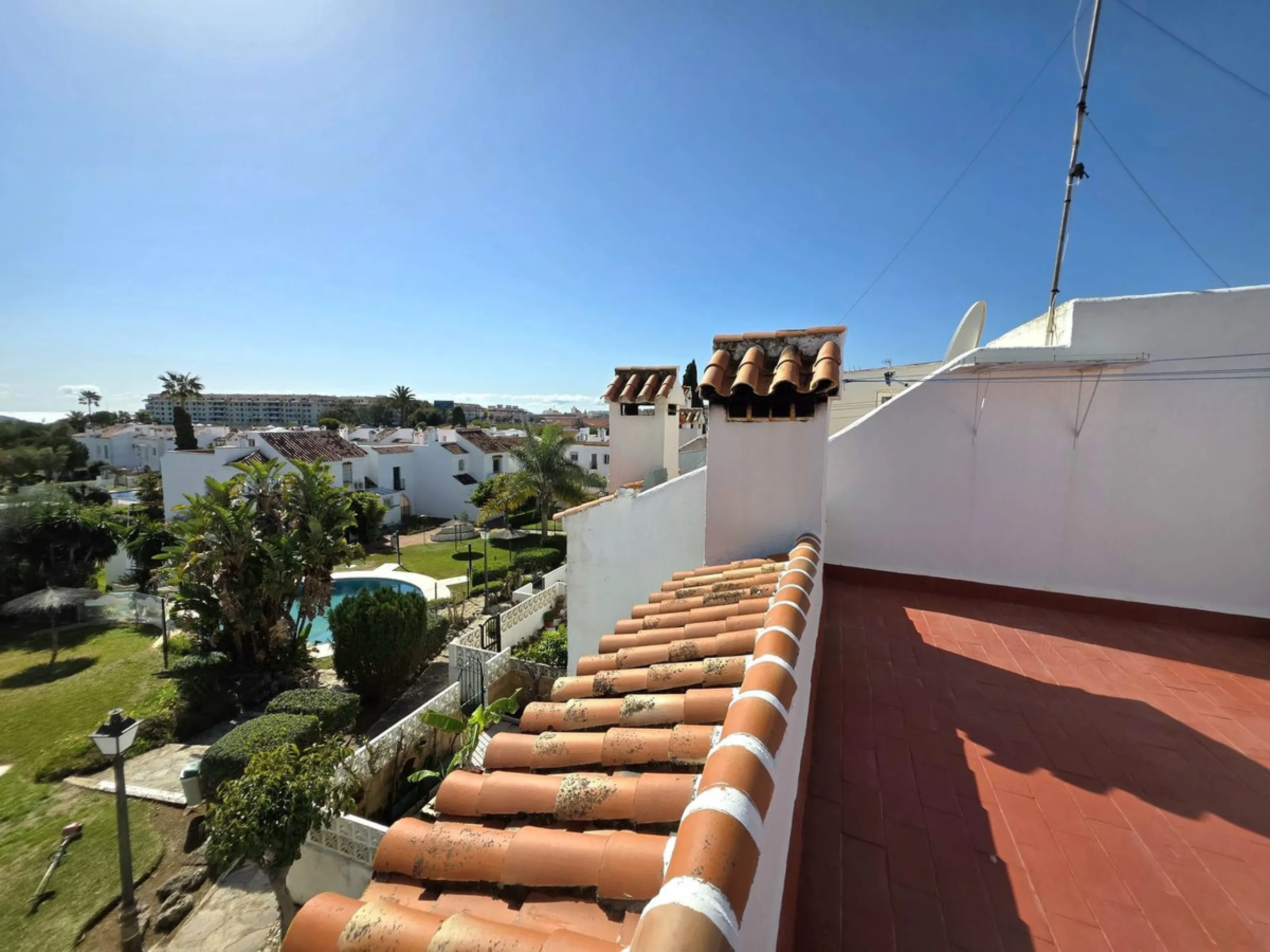 This beautiful 3 bed townhouse is located in a fantastic area, walking distance to all amenities and the beach. The house is Andalucian in style, built over 3 levels and sold fully furnished. On the ground level you are greeted by an entrance hall and lar