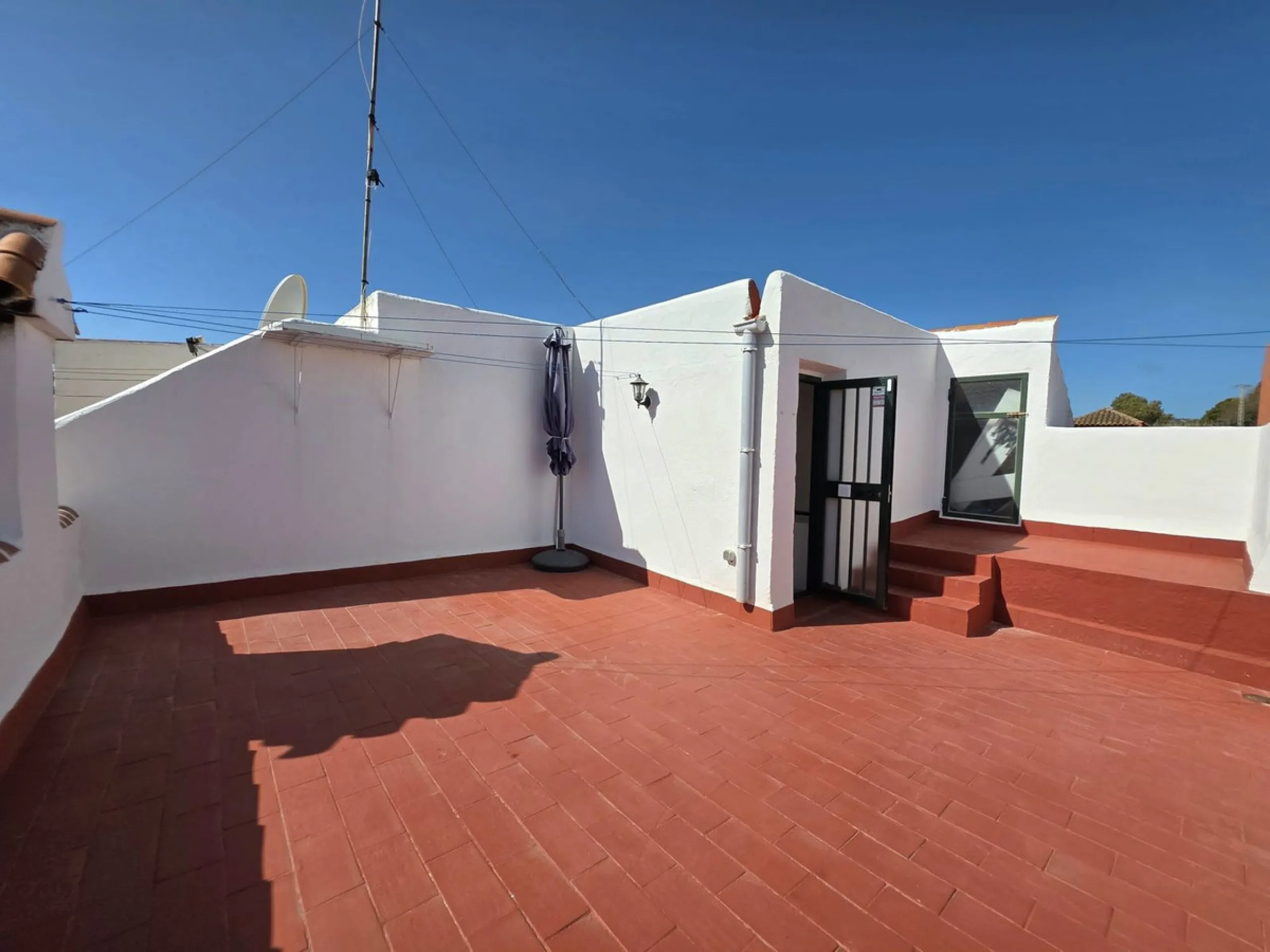 This beautiful 3 bed townhouse is located in a fantastic area, walking distance to all amenities and the beach. The house is Andalucian in style, built over 3 levels and sold fully furnished. On the ground level you are greeted by an entrance hall and lar