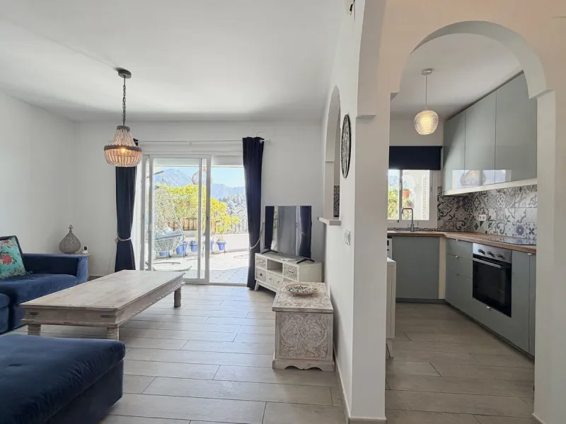 EXCLUSIVE to Nerja Properties - Set on the peaceful edge of the whitewashed village of Frigiliana, this beautifully maintained duplex apartment offers a rare blend of tranquillity, space, and spectacular scenery. A much-loved family home for many years, t