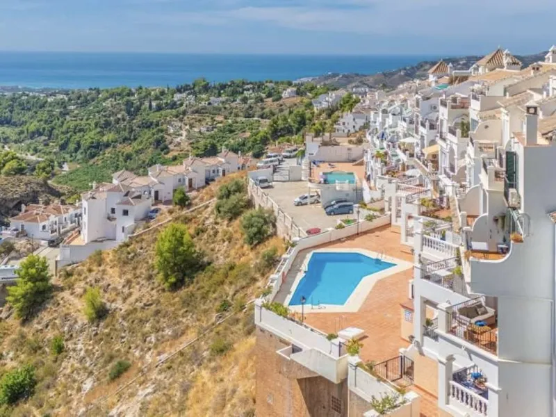 EXCLUSIVE to Nerja Properties - Set on the peaceful edge of the whitewashed village of Frigiliana, this beautifully maintained duplex apartment offers a rare blend of tranquillity, space, and spectacular scenery. A much-loved family home for many years, t