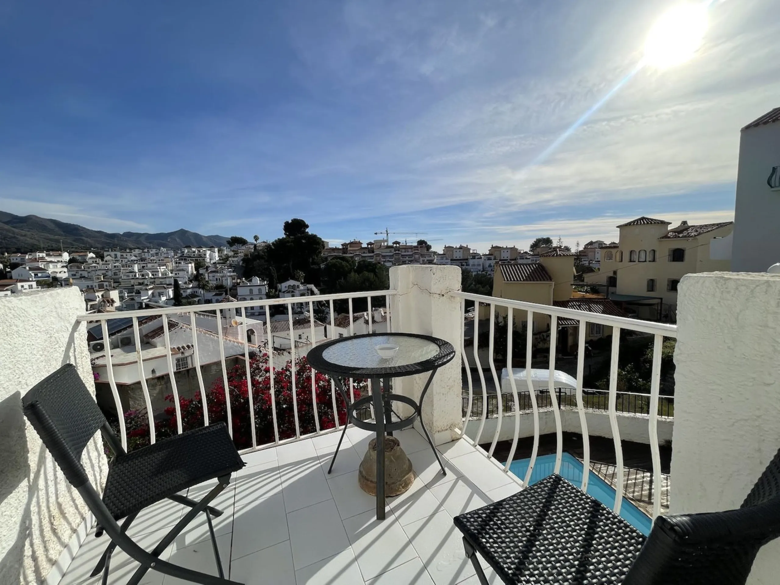 Lovely four bedroom, three bathroom villa built over three floors. Upon entering the main house, there is a spacious open plan kitchen and living room with fireplace, with a separate WC, an East facing balcony and a South facing terrace. The stairs lead t