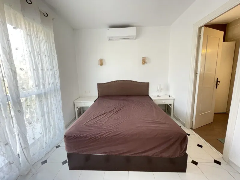 Lovely four bedroom, three bathroom villa built over three floors. Upon entering the main house, there is a spacious open plan kitchen and living room with fireplace, with a separate WC, an East facing balcony and a South facing terrace. The stairs lead t