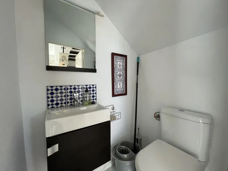Lovely four bedroom, three bathroom villa built over three floors. Upon entering the main house, there is a spacious open plan kitchen and living room with fireplace, with a separate WC, an East facing balcony and a South facing terrace. The stairs lead t