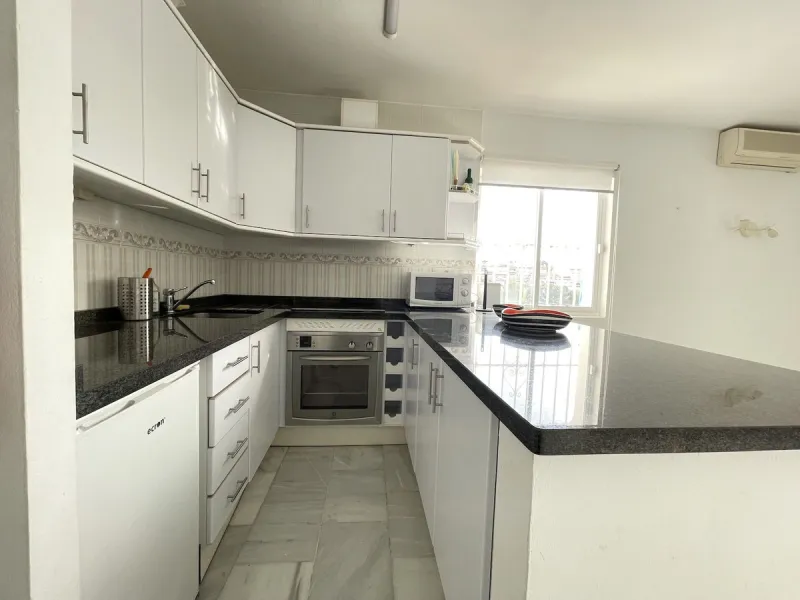 Lovely four bedroom, three bathroom villa built over three floors. Upon entering the main house, there is a spacious open plan kitchen and living room with fireplace, with a separate WC, an East facing balcony and a South facing terrace. The stairs lead t