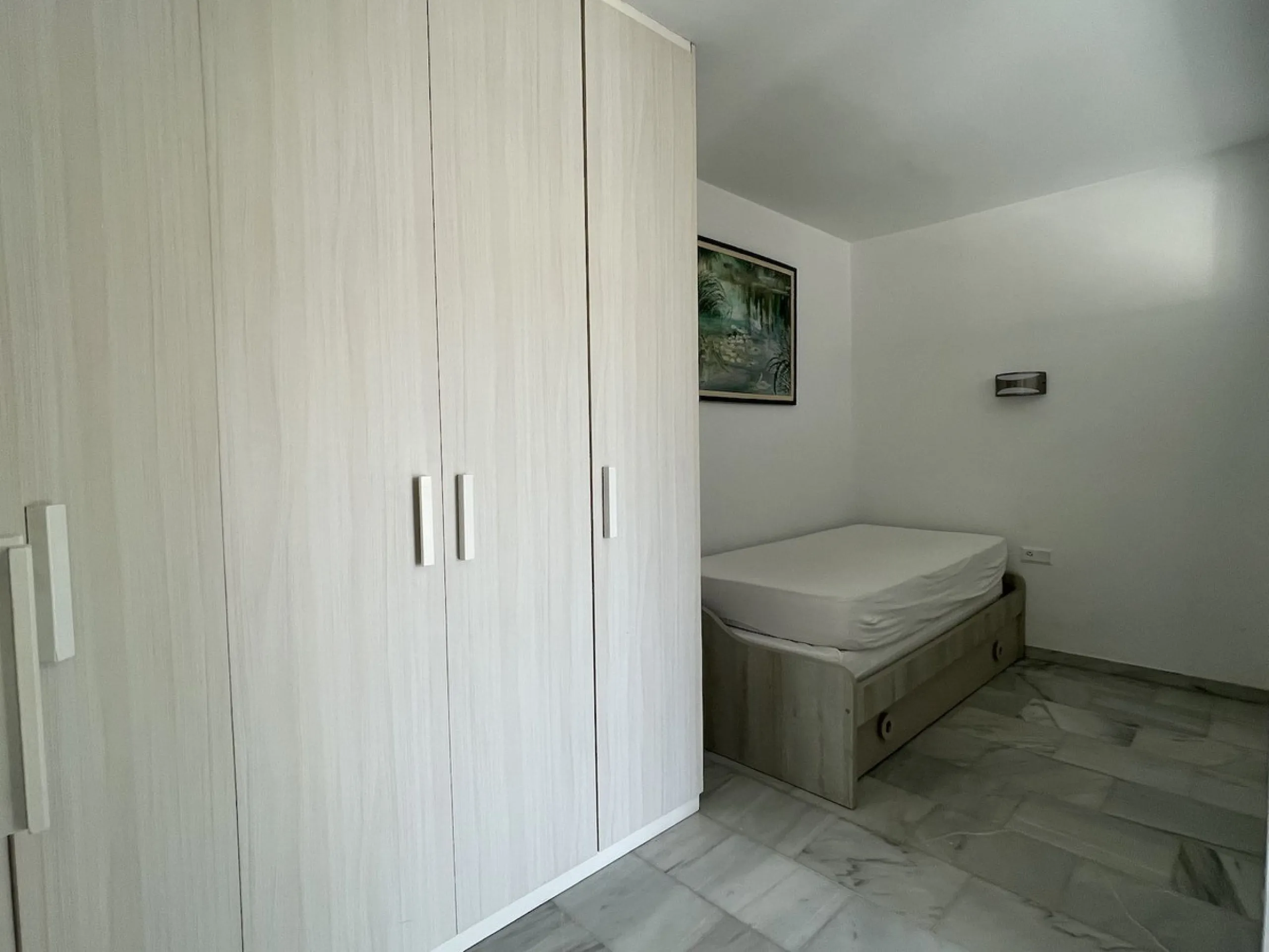 Lovely four bedroom, three bathroom villa built over three floors. Upon entering the main house, there is a spacious open plan kitchen and living room with fireplace, with a separate WC, an East facing balcony and a South facing terrace. The stairs lead t