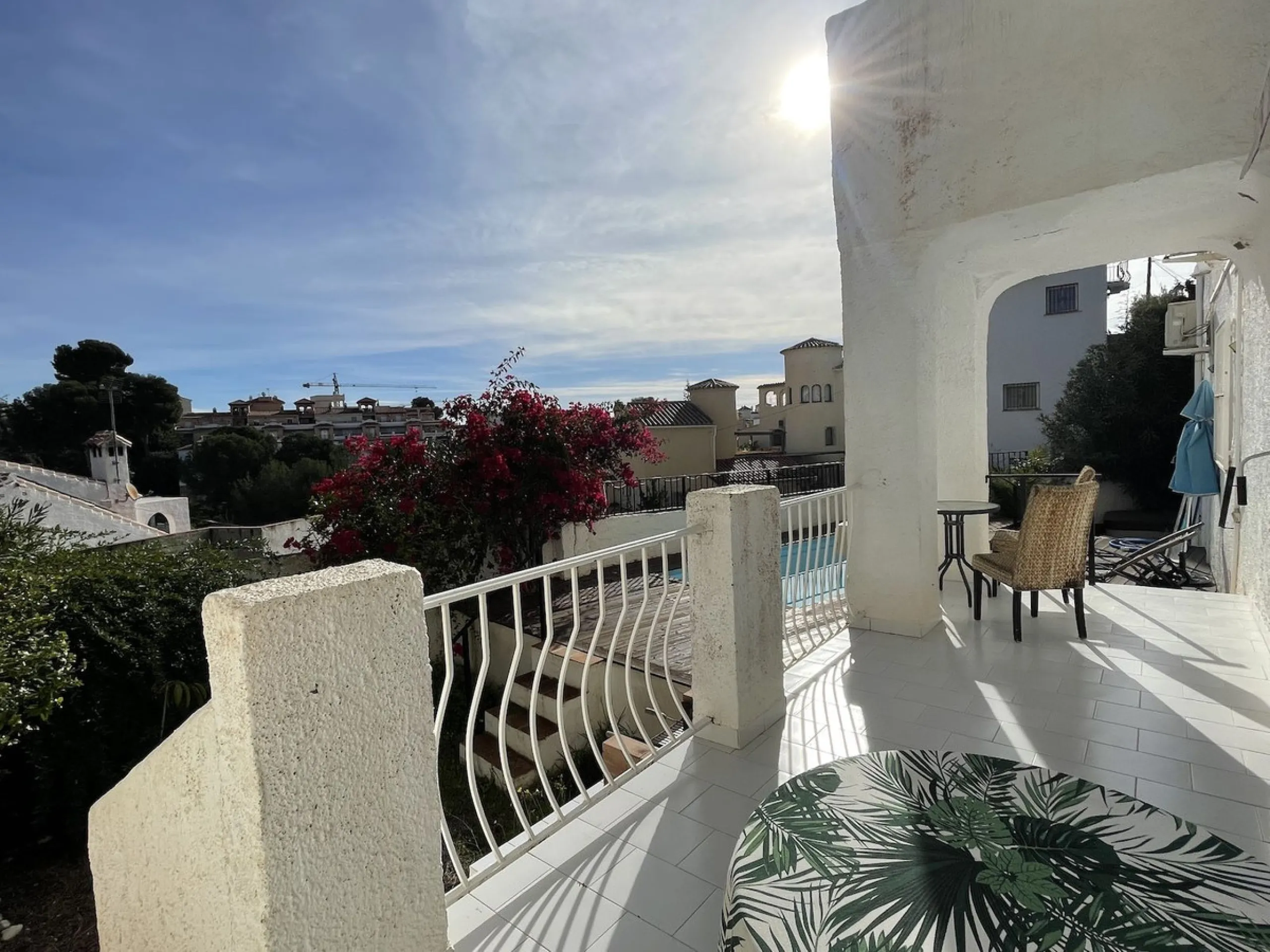 Lovely four bedroom, three bathroom villa built over three floors. Upon entering the main house, there is a spacious open plan kitchen and living room with fireplace, with a separate WC, an East facing balcony and a South facing terrace. The stairs lead t